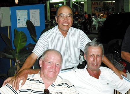 Rab McDonald, front left, celebrates with Geoff Parker, right, and Mashi after winning the A Flight at Bangpra.